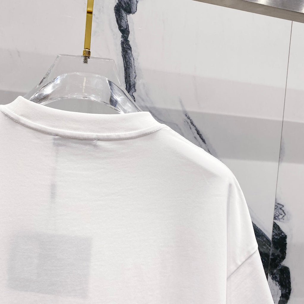 Three-dimensional embossed letter T-shirt